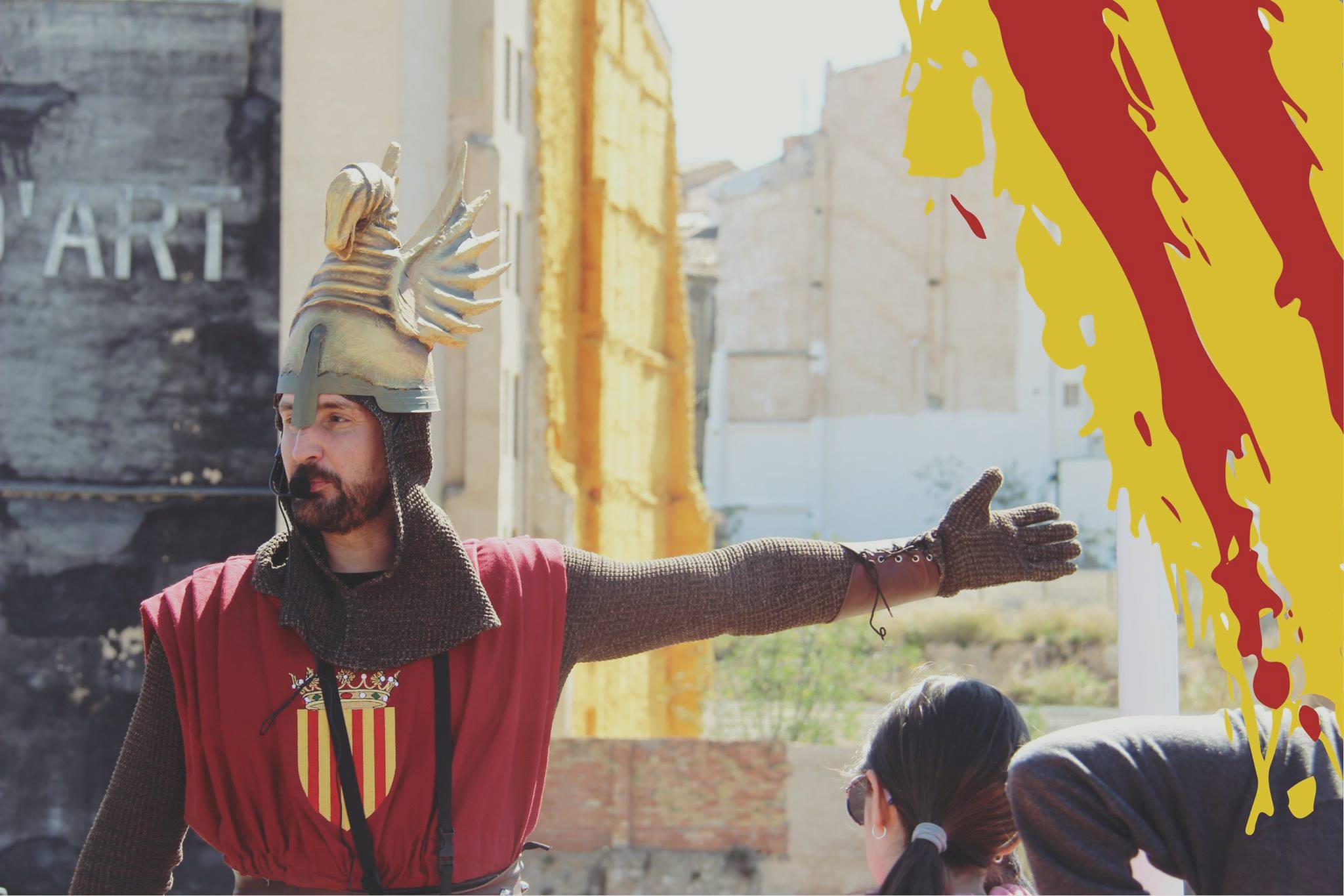 tourist guide disguised as a medieval while visiting Alcoy